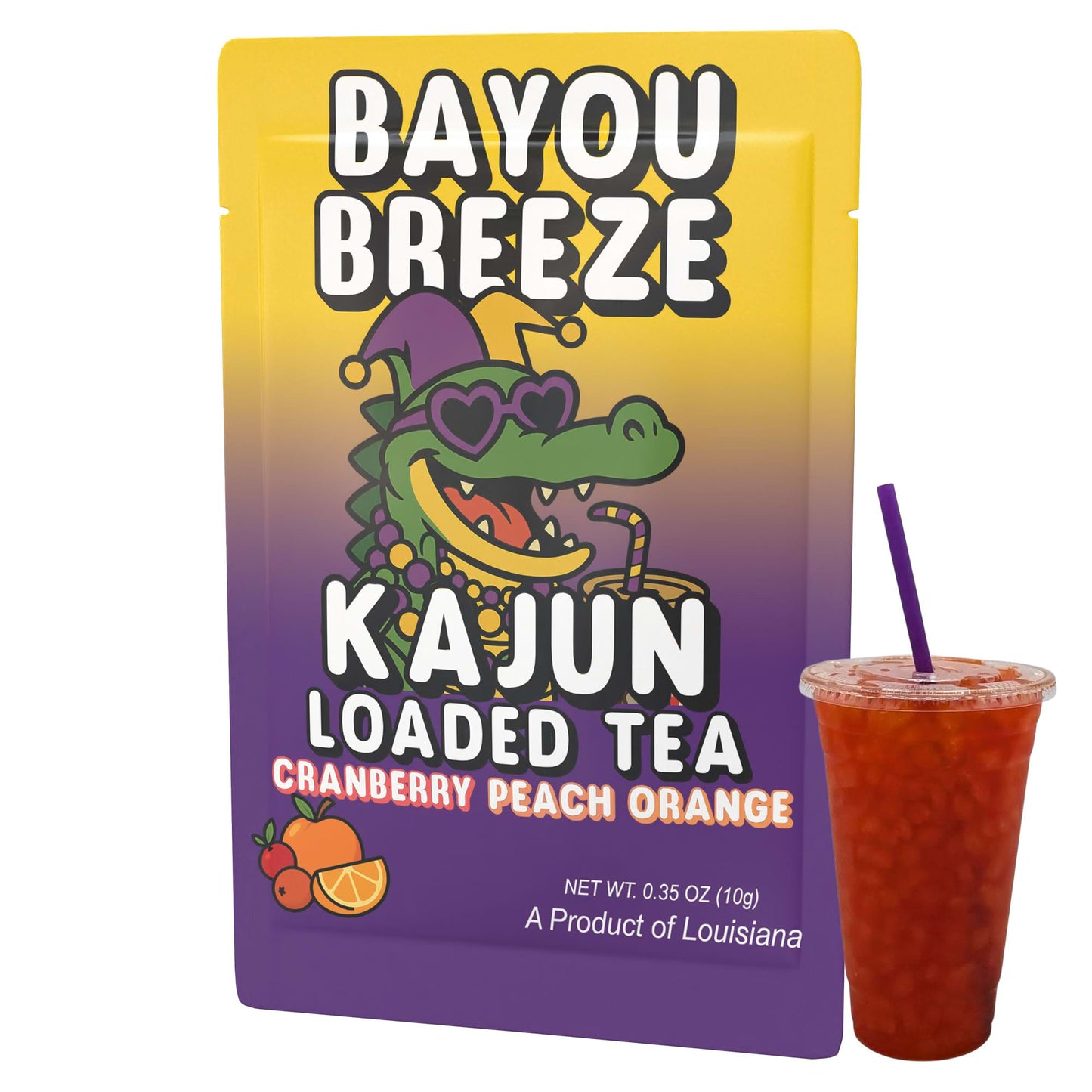 A single packet of Kajun Loaded Tea "Bayou Breeze", featuring the alligator mascot with a Mardi Gras theme, standing next to a clear cup of the prepared, reddish-orange loaded tea.