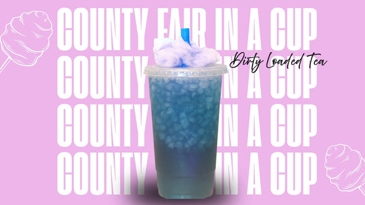 County Fair in a Cup loaded tea recipe. Shows a blue drink with cotton candy on top.